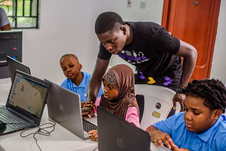 Boy taking test on a laptop