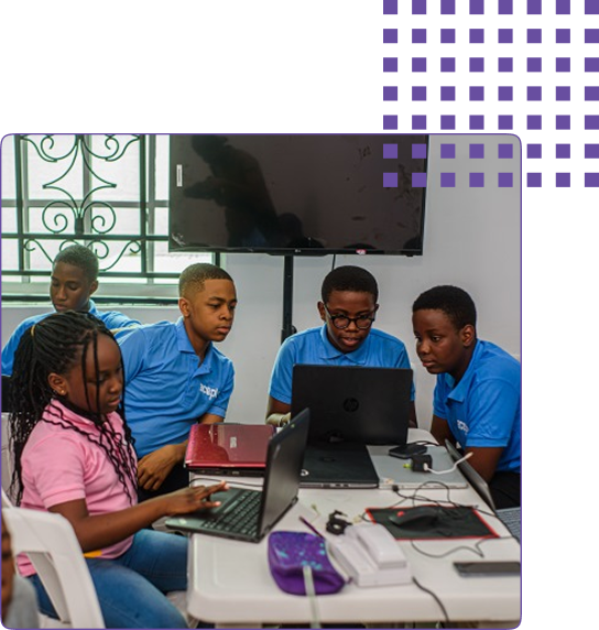 Picture of five (5) girls interacting with an iPad